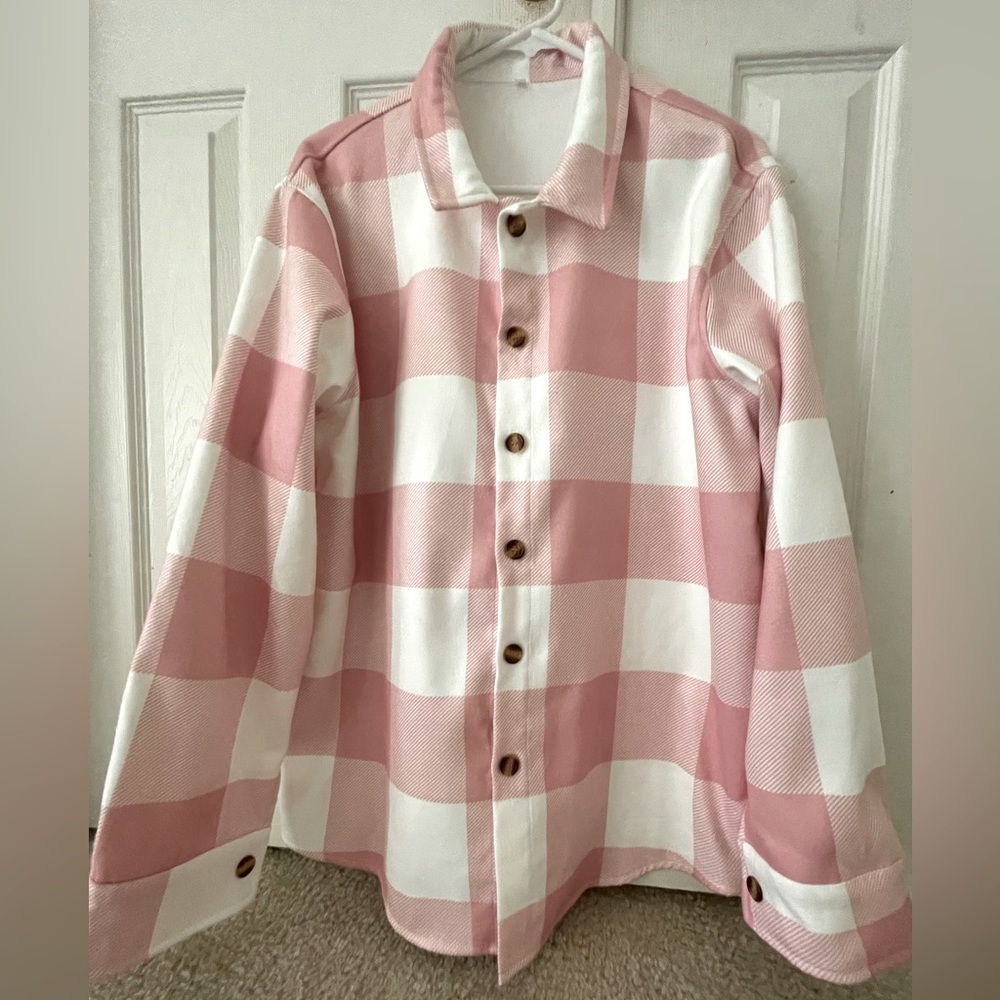 Pink and white flannel button down shirt. Never worn !